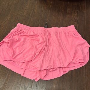 Neon pink athletic shorts